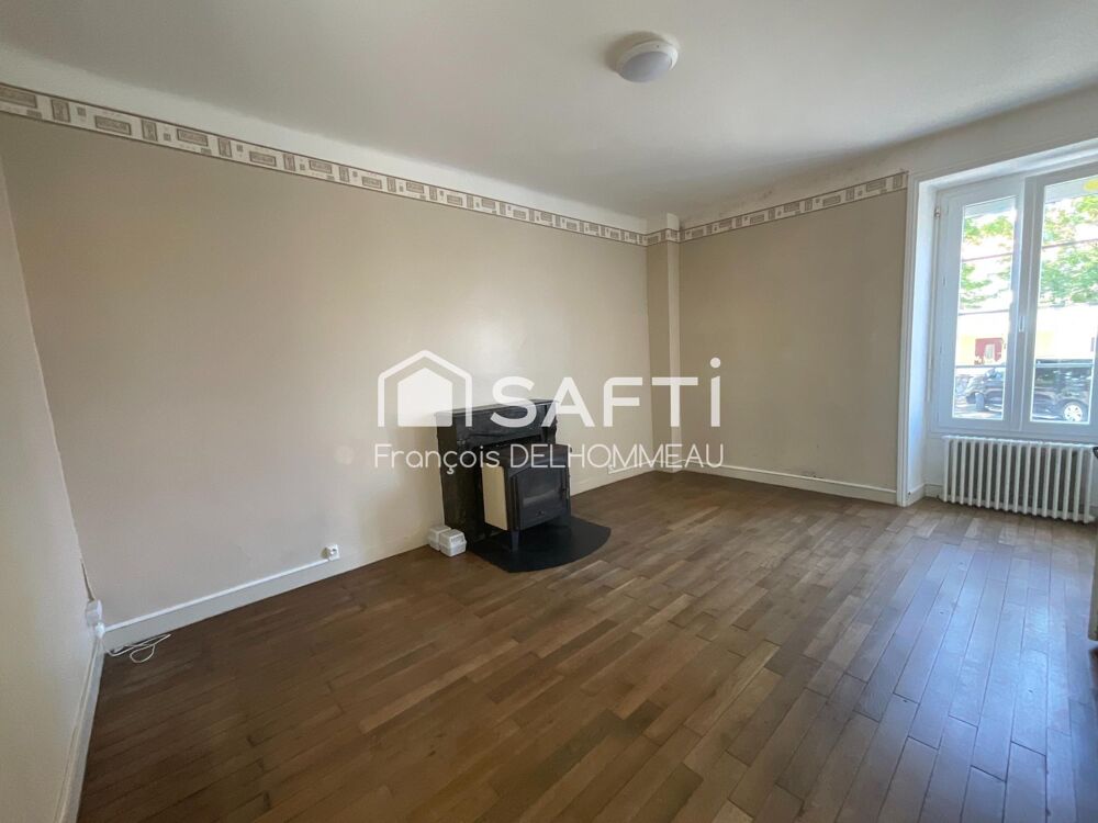 Maison mitoyenne 91m2, 2 chambres, bureau 18m2 et terrain clôturé