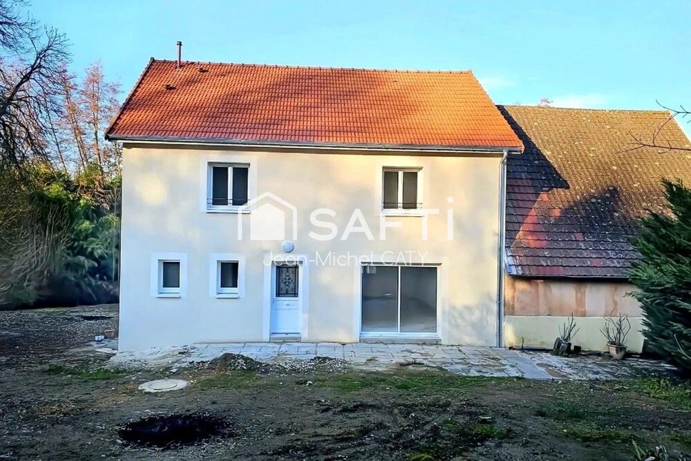 Maison neuve avec sa grange et dépendances