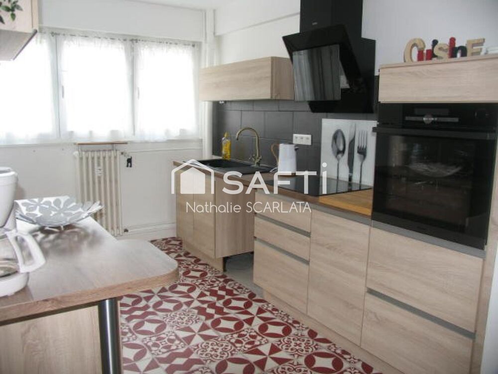 Appartement rénové de 72 m² avec 2 chambres, balcon et garage
