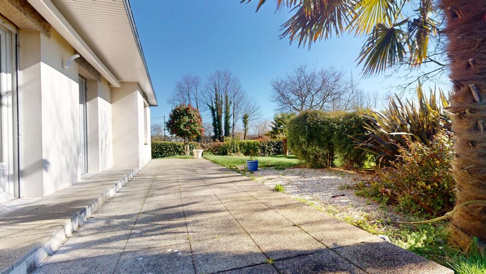 Vente Maison Maison 4 chambres, avec vie de plain-pied, sous-sol complet et jardin arboré de 1 000 m². Scaer