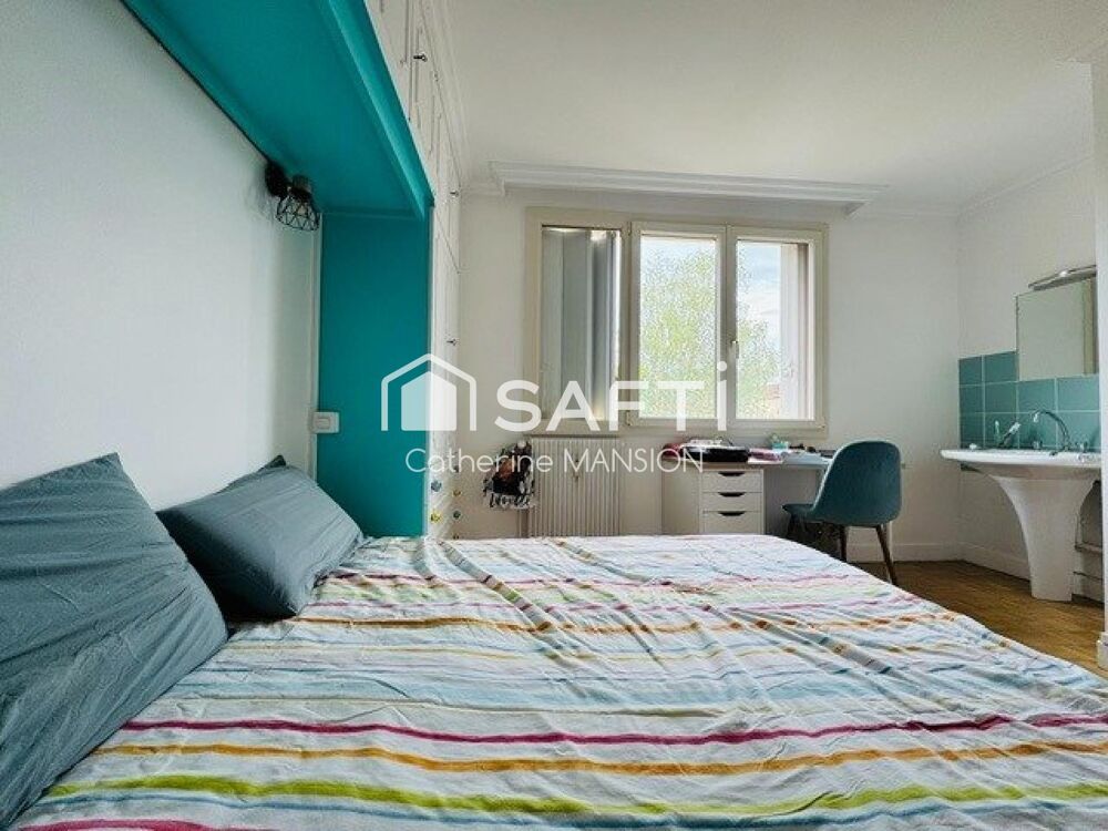 Investisseurs, belle rentabilité assurée pour cet appartement traversant et lumineux qui comprend 4 chambres pouvant être louées