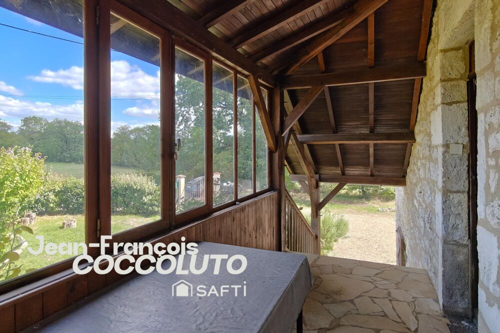 Vente Maison Maison ancienne en pierre de 65 m² avec deux chambres, garage, cave et jardin arboré Porte du quercy