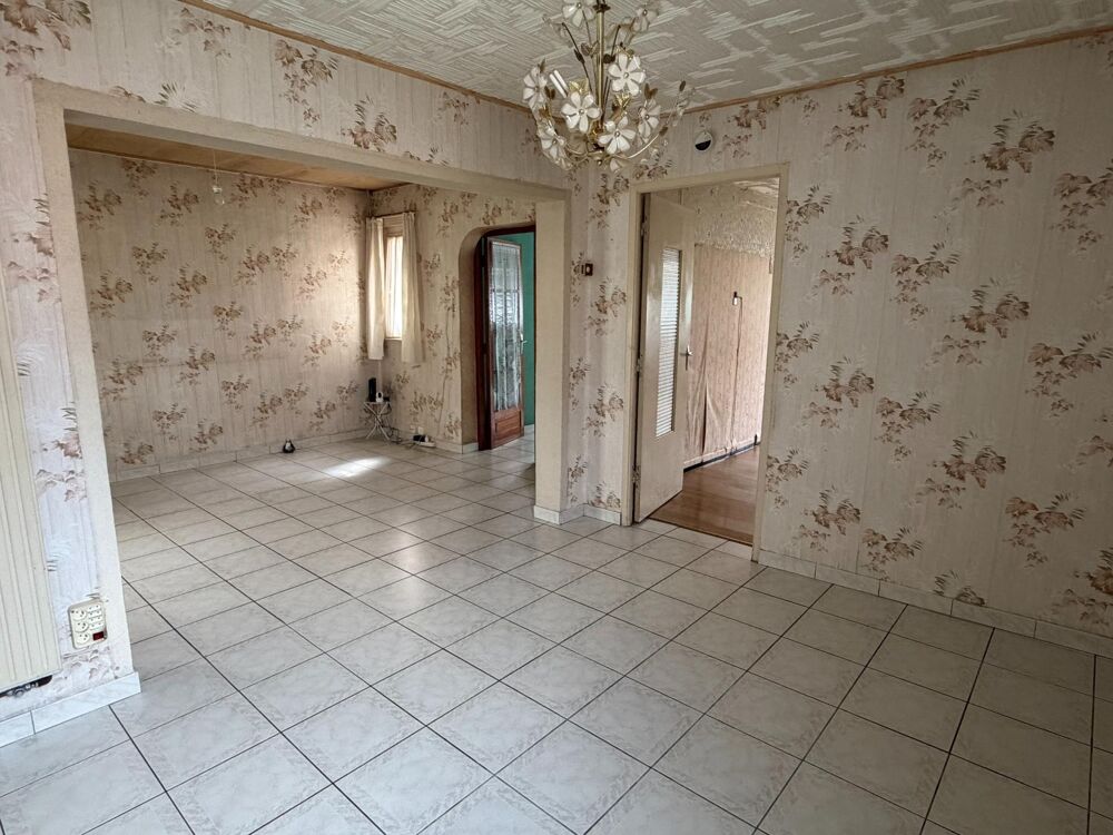 Plain pied en fond d'impasse avec jardin et garage