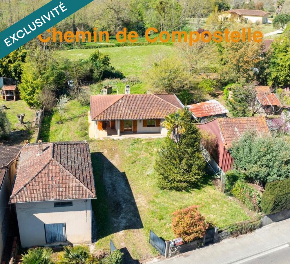 Maison avec dépendance, garage et terrain arboré /