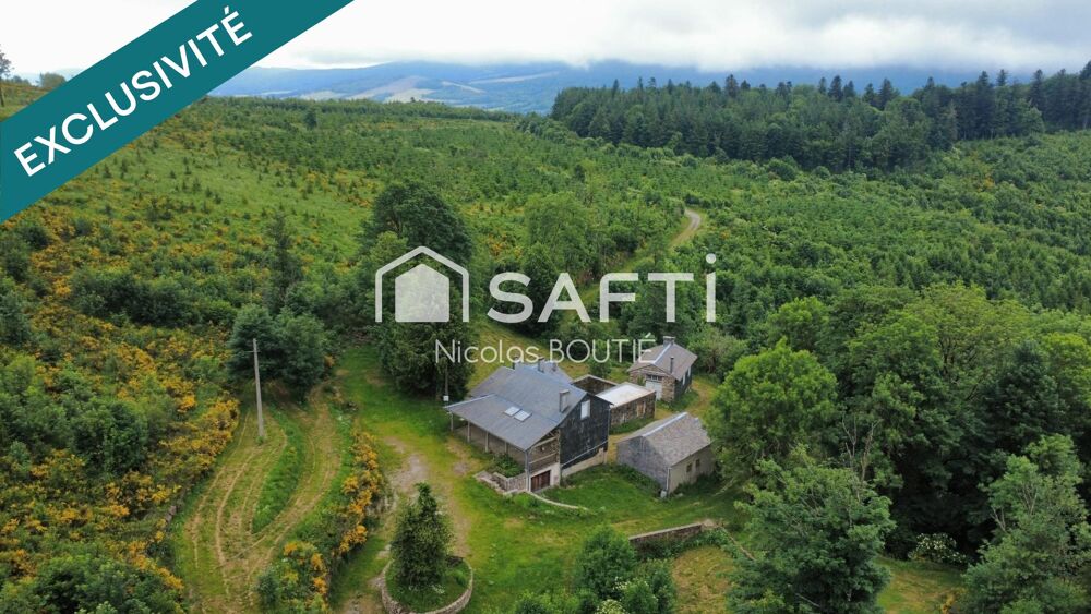 Maison avec dépendances sur terrain de 3,2 ha