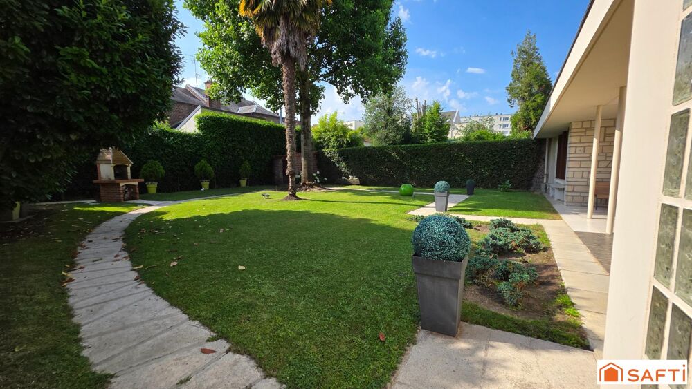TRES RARE !! Maison d'architecte d'environ 199m², 3 chambres, bureau, jardin clos, garage, habitable de PLAIN PIED