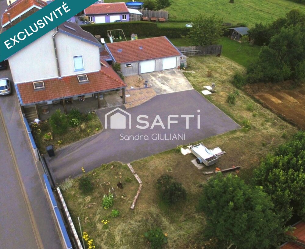 Maison spacieuse avec garage, terrasse, jardin au calme absolu !