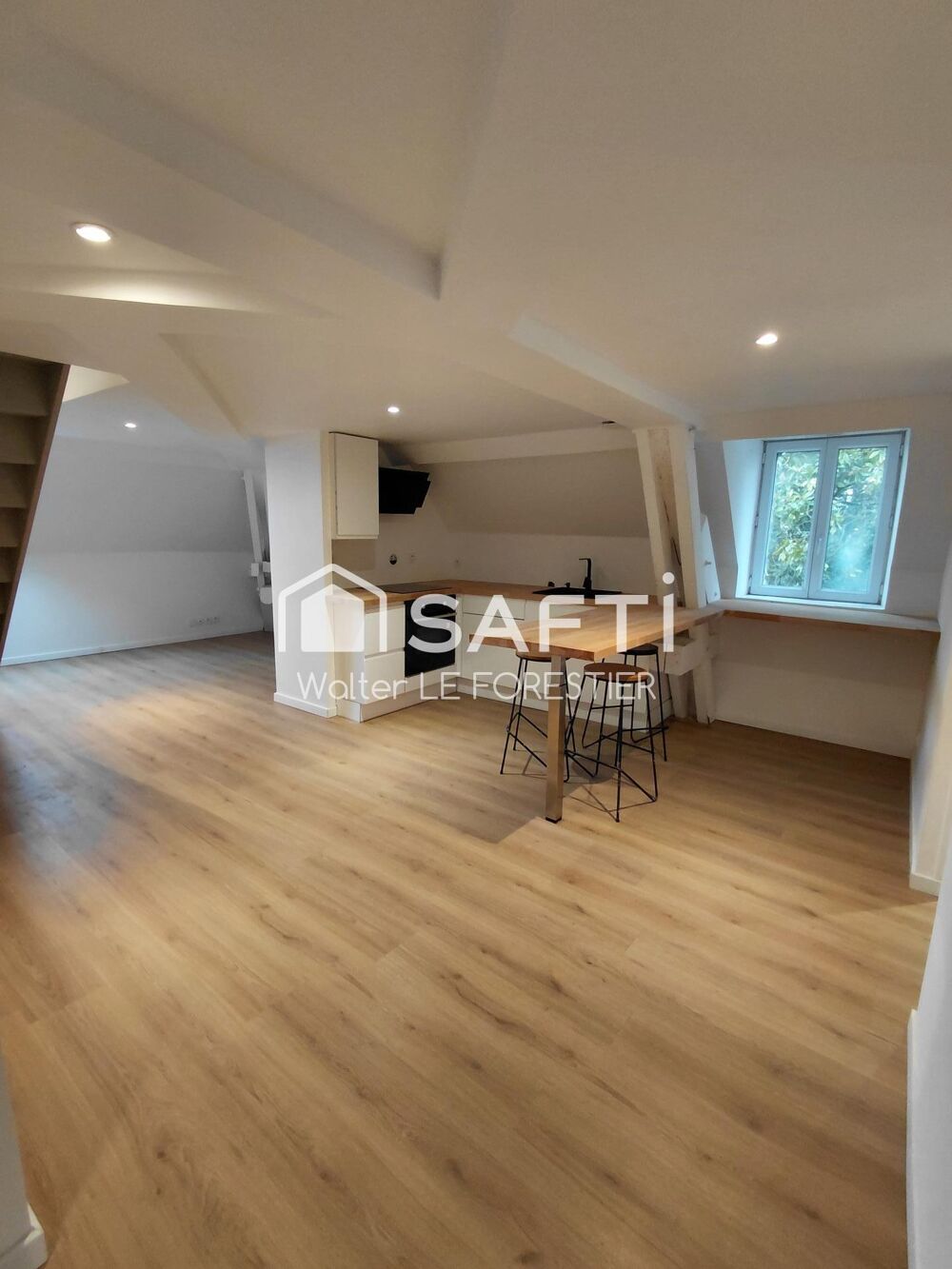 APPARTEMENT T3 DUPLEX RENOVE AVEC JARDIN ET PLACE DE PARKING