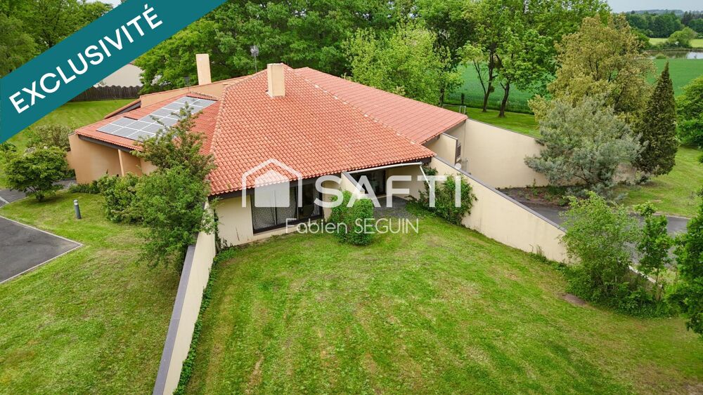 Maison d'architecte de 228 m2 édifiée sur une propriété arborée de 5384 m2 constructible au PLUI