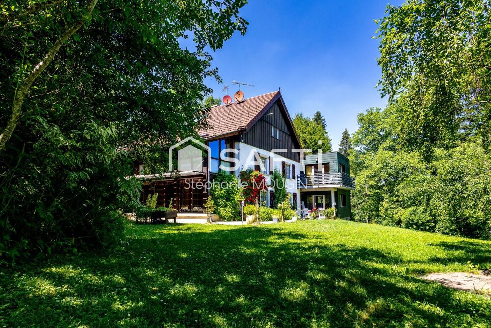 Vente Maison Propriété d'exception au cœur du Pays Horloger – Un domaine unique de plus de 805 m² habitables dans un ecrin de verdure. Le russey
