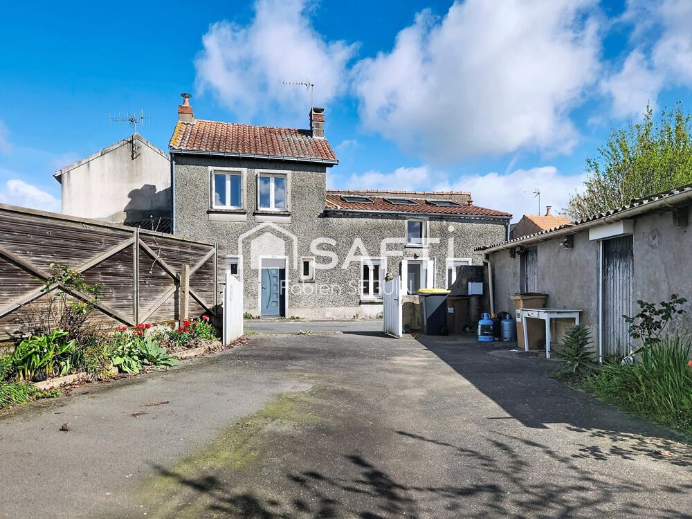 Fort potentiel pour cet ensemble immobilier comprenant une maison ancienne et un terrain constructible