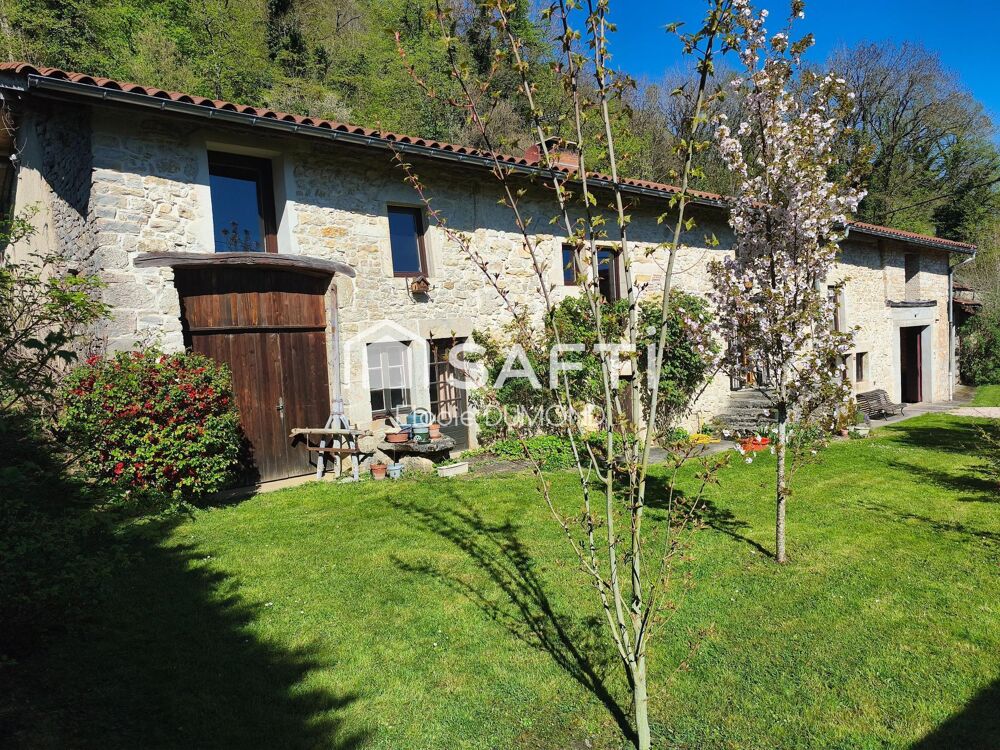Très belle maison en pierre d'une surface habitable de 174 m2 avec terrain arboré de 2060 m2