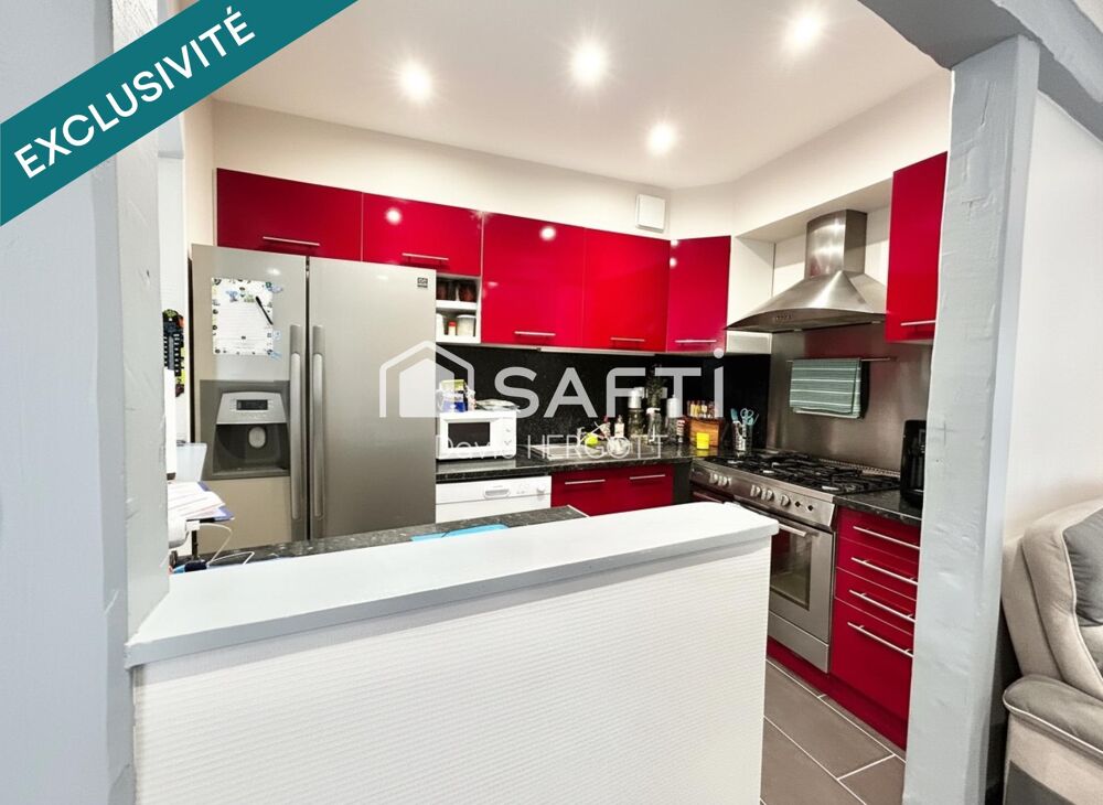 Propriété composée de deux logements  1052 m² de terrain clôturé