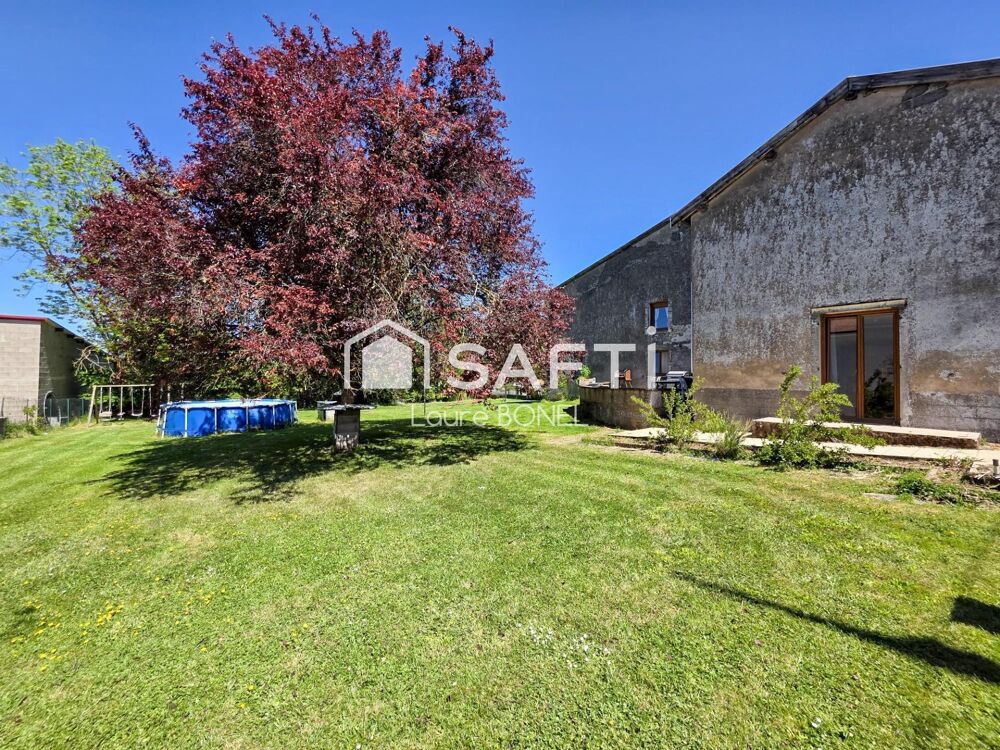 Maison de village aux volumes XXL, jardin agréable