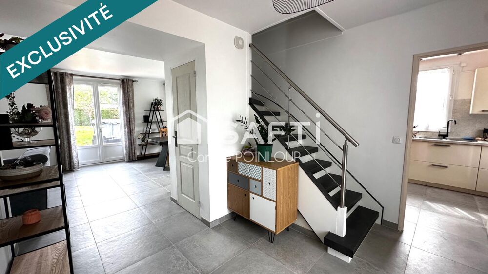 Maison individuelle dans un cadre verdoyant