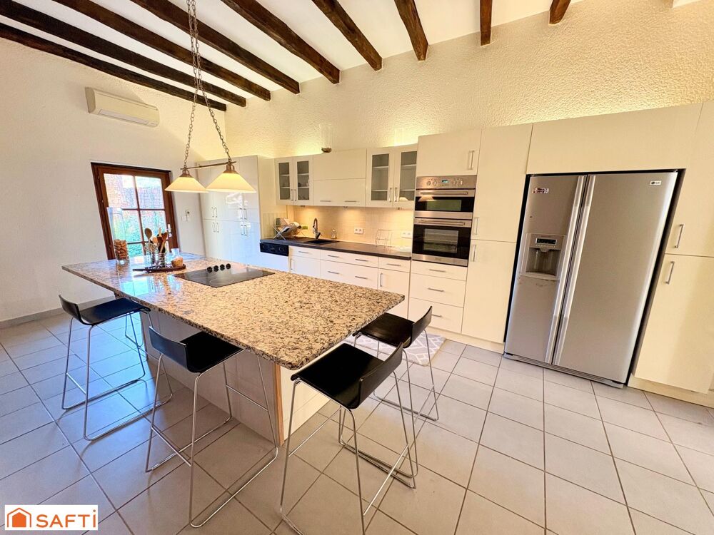 Maison de caractère en pierre  185 m²  4 chambres  Jardin et dépendances