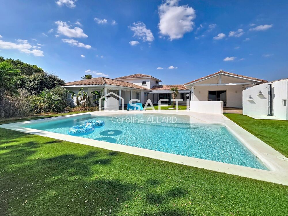 PROPRIETE D'EXCEPTION DE 253M² / 6 CHAMBRES SUR UNE PARCELLE DE 4800M² AVEC PISCINE LAGON A LOMBEZ