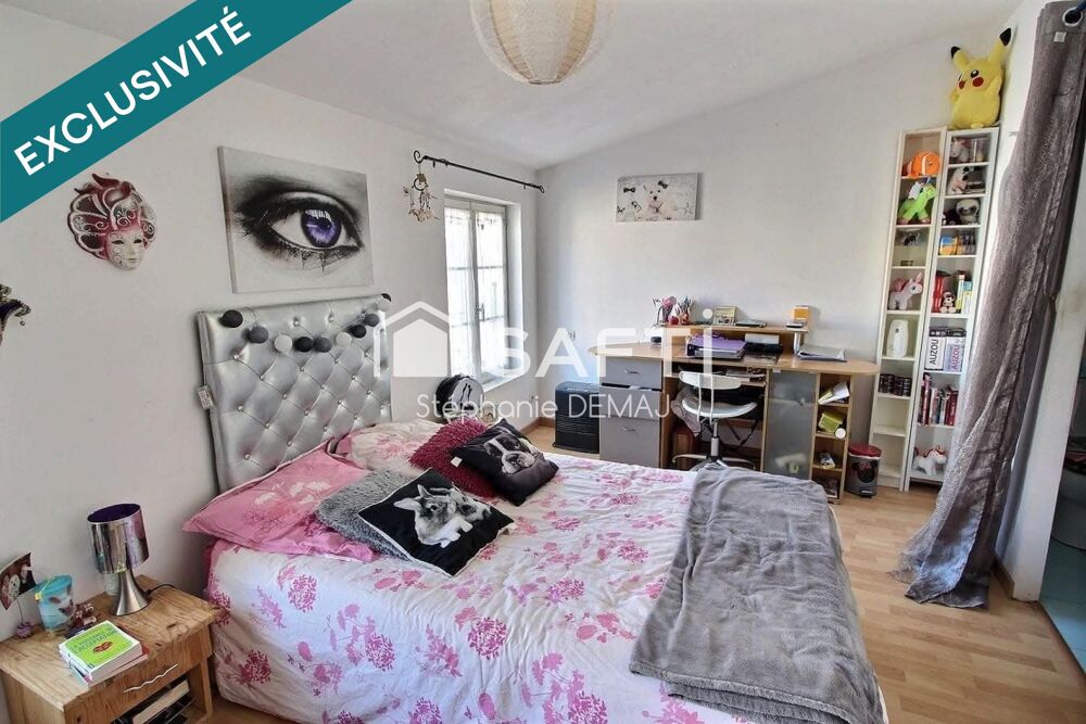 Maison de ville avec garage -cave- atelier