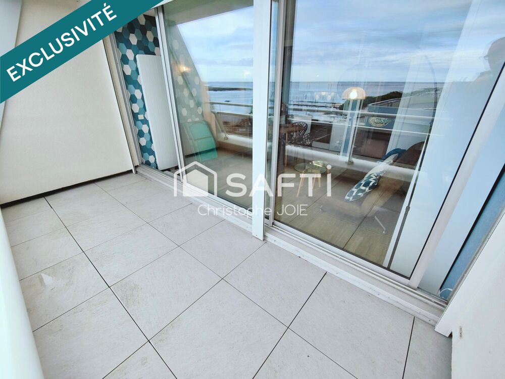 Vue bassin-Rénové-Ascenseur-Terrasse-Parking-Cave.