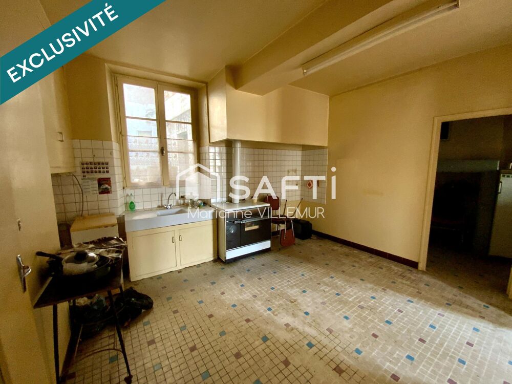 Maison de ville d'environ 140 m² habitables  Fort potentiel à Mézin