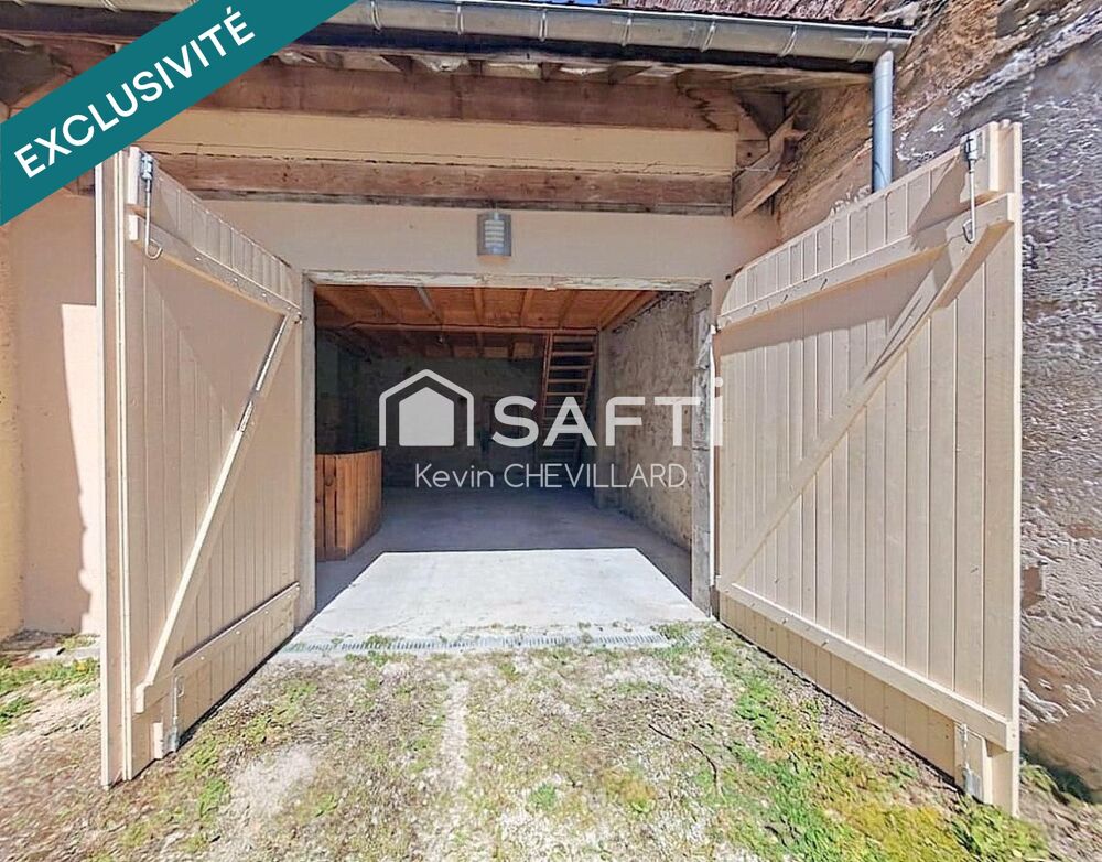 Maison avec grande pièce de vie coup de coeur et garage.