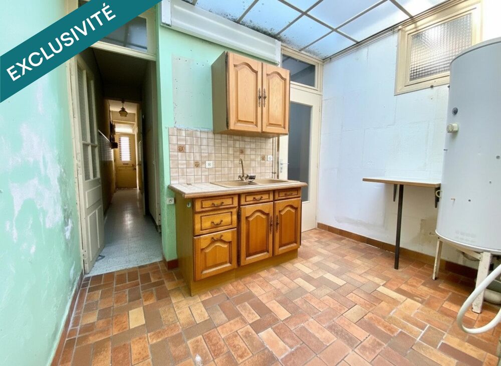 Maison proche du centre ville avec garage, cour et dépendances