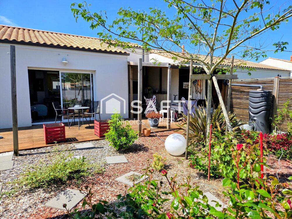 PLAIN PIED IMPECCABLE , DEUX CHAMBRES , GARAGE, JARDIN ET PLUS !