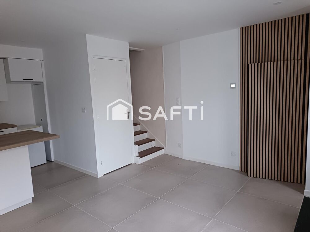 Vente Appartement Maison de ville en pierre rénovée au centre bourg Plerguer
