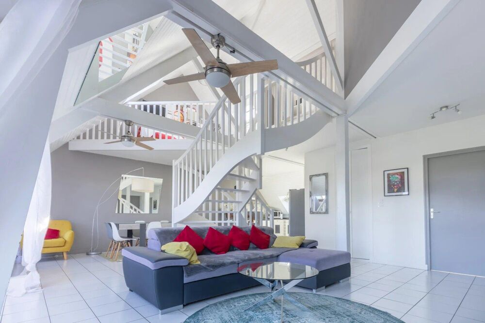 Duplex 120m² au sol esprit loft en dernier étage