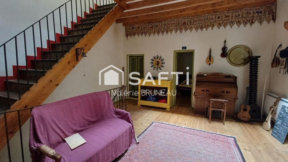 Maison au coeur de la place de Réalmont de 230 m² avec local commercial déjà loué