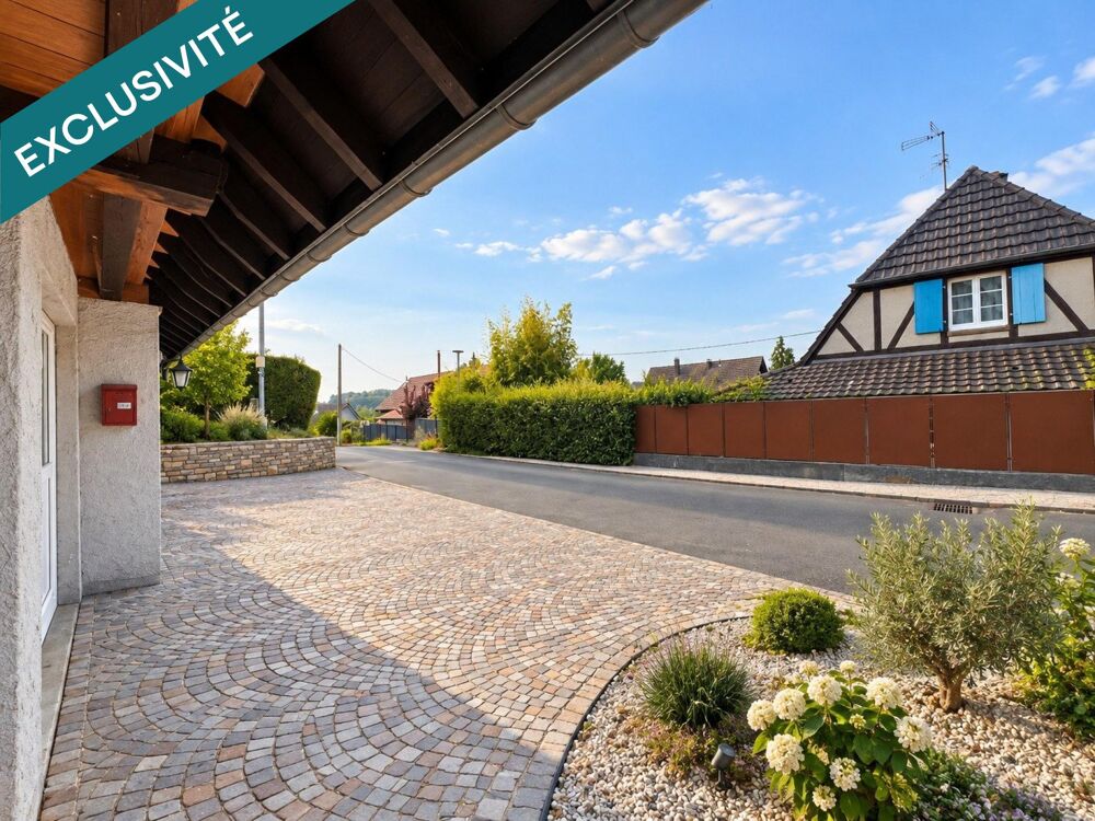 Belle petite maison avec deux garages dans un cadre verdoyant et au calme