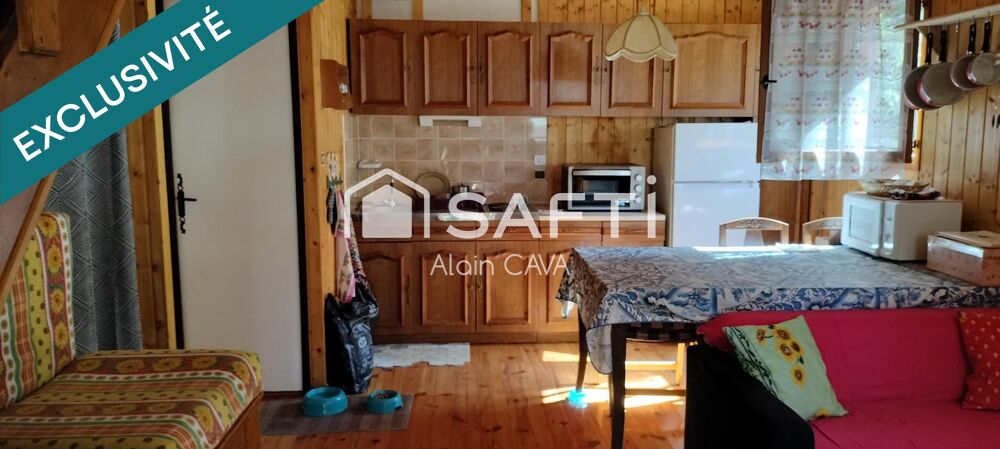 Chalet de 51m² sur 2 niveaux avec garages, vide sanitaire sur 552 m² de terrain cloturé
