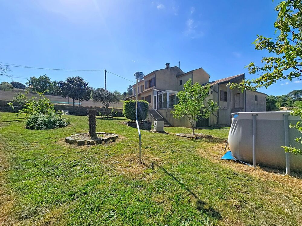Vente Maison Une propriété rare à Bédarieux, alliant volumes, prestations modernes triple garage et vaste terrain constructible. Bedarieux