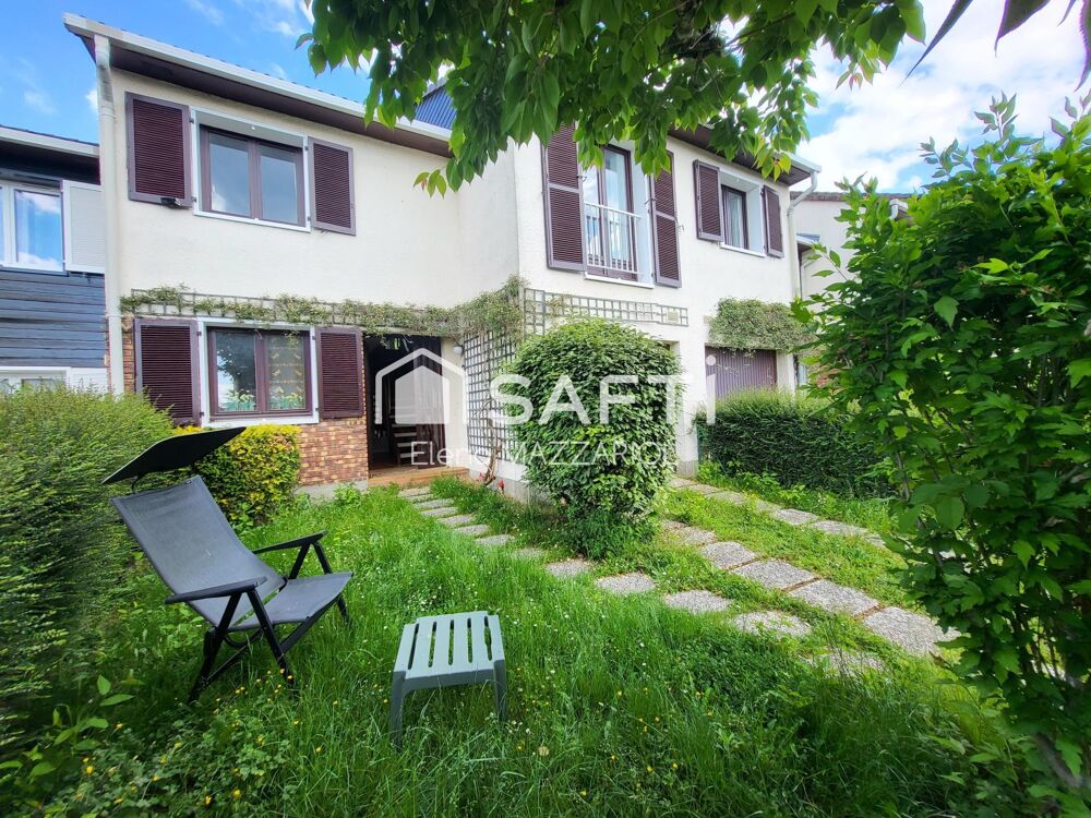 Maison familiale 4 chambres avec double jardin privatif dans un cadre privilégié