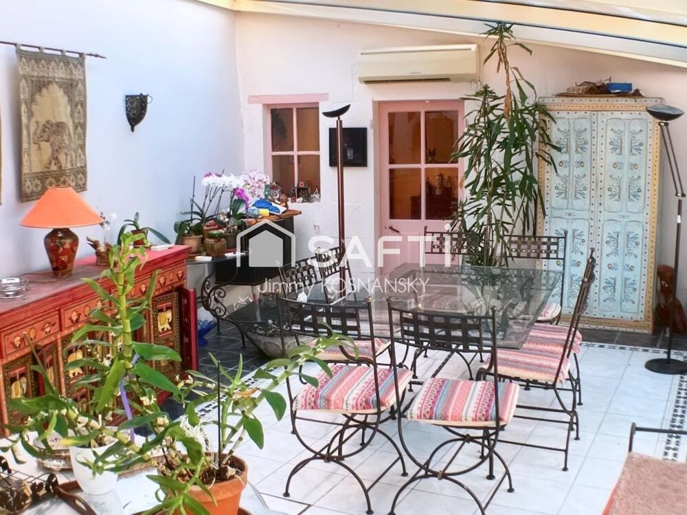 Maison de caractère et jardin arboré