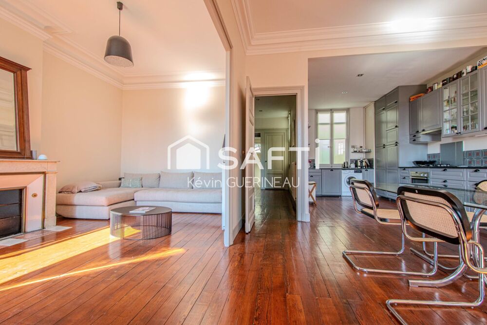 Appartement de standing Triangle d'or 112m2 au dernier étage d'un immeuble classé