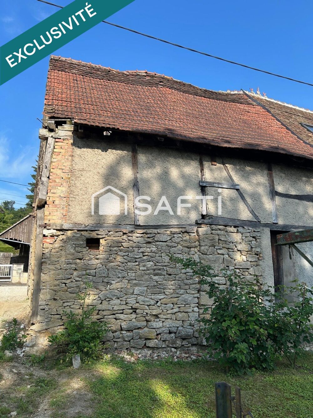 Grange de 90m² à réhabiliter entièrement au coeur de Walheim avec parking.