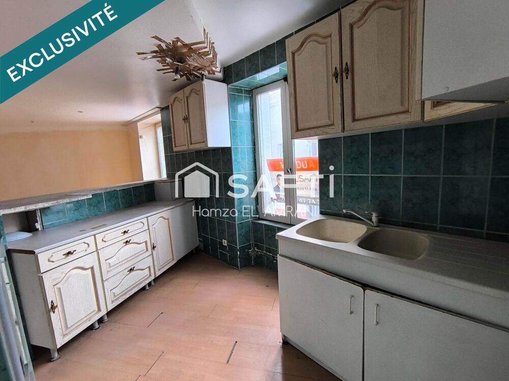 Immeuble de rapport en centre ville 2 appartements et un commerce