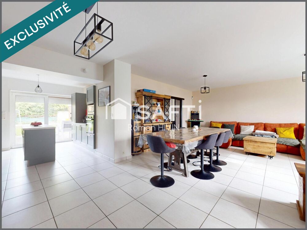 Maison familiale semi plain-pied, secteur calme avec jardin et double garage