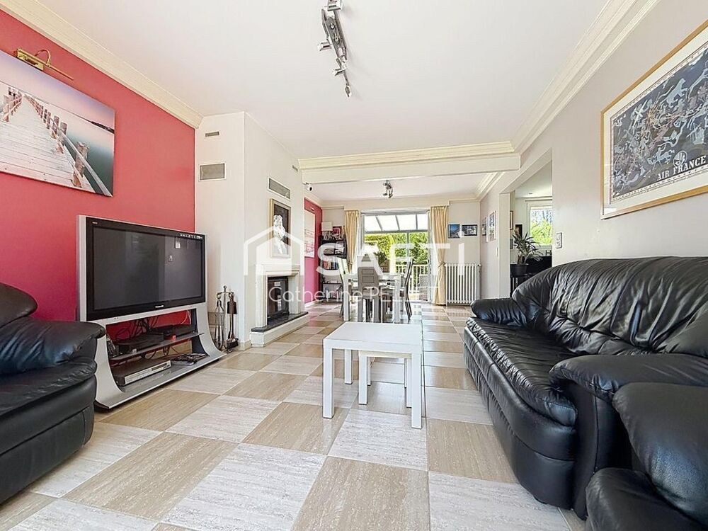Maison familiale sans travaux avec garage 3 véhicules et jardin arboré