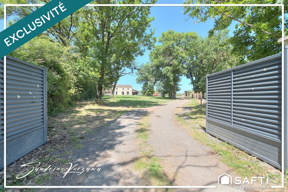 Domaine équestre: habitation en pierre et centre équestre