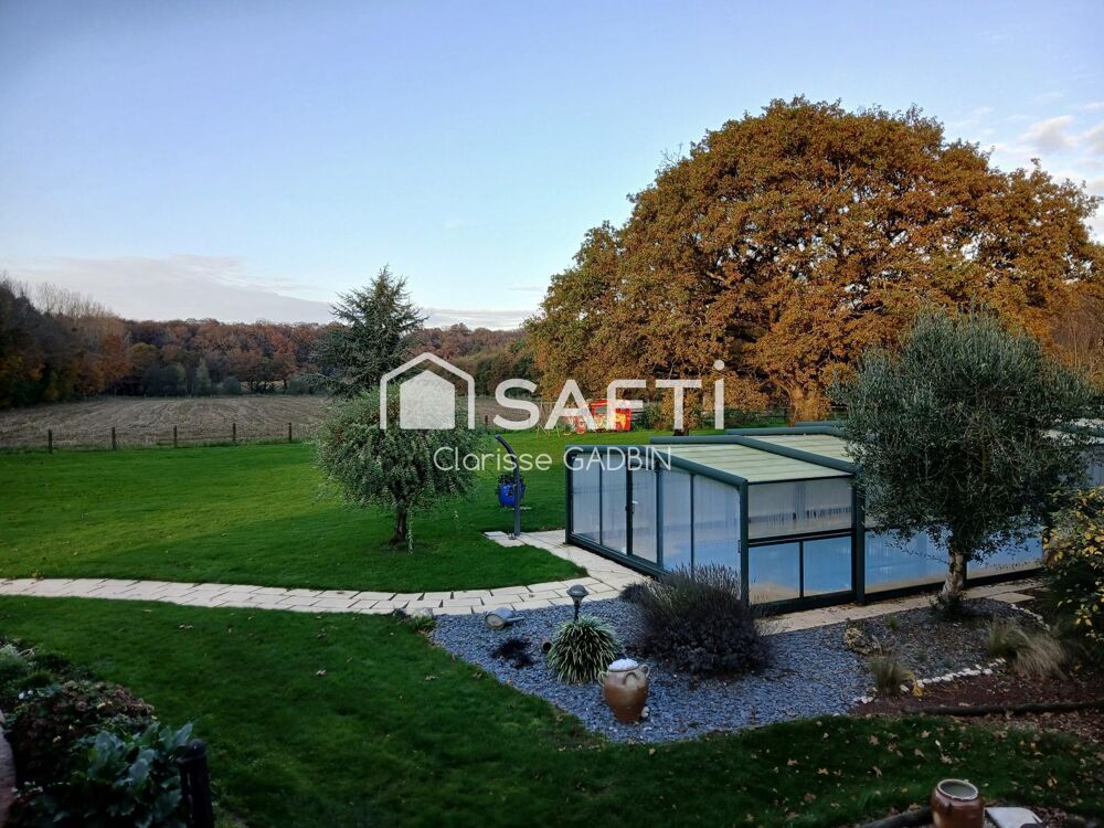 Vente Maison Magnifique propriété avec longère rénovée avec 3 chambres, piscine couverte, 16 hectares de terrain dont bois La rouaudiere