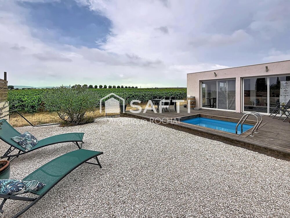 Villa moderne de plain-pied de 109 m² située à Adissan avec une piscine