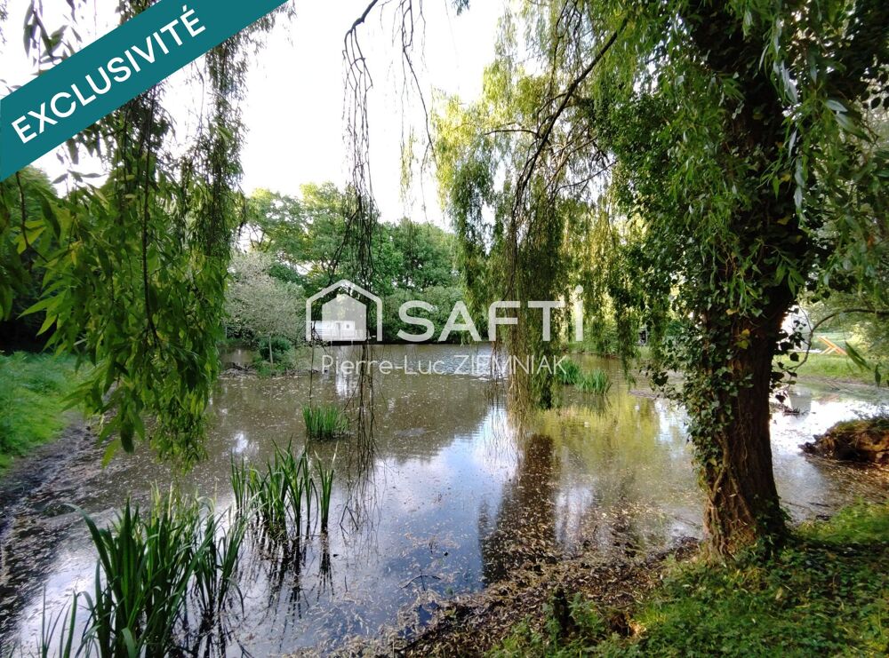 Vente Terrain Terrain de loisirs avec étang et mobil-home – 4100 m² clos à Houssay (53360) Houssay