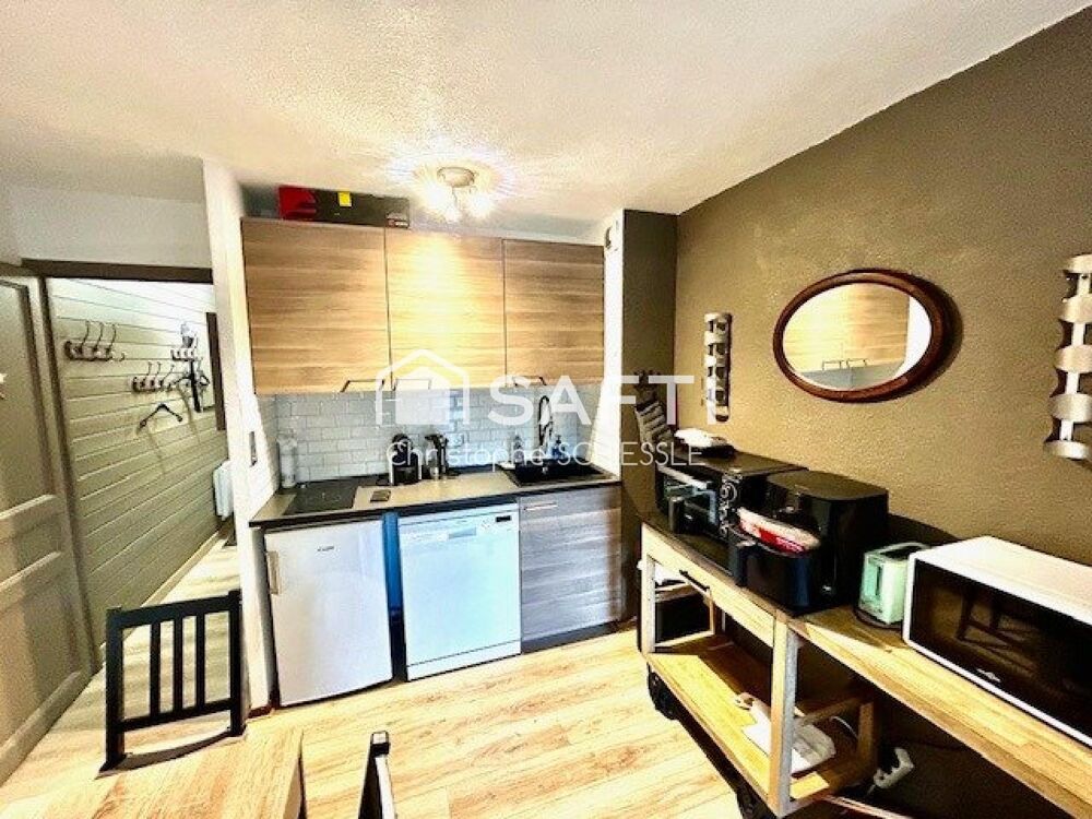 Appartement T2 de 28 M2 avec parking couvert, cave et local à Ski