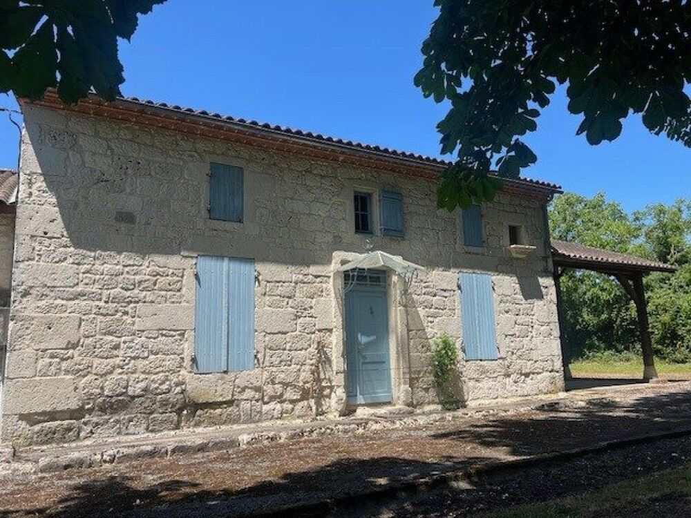 Demeure en pierre avec dépendances et parc arboré