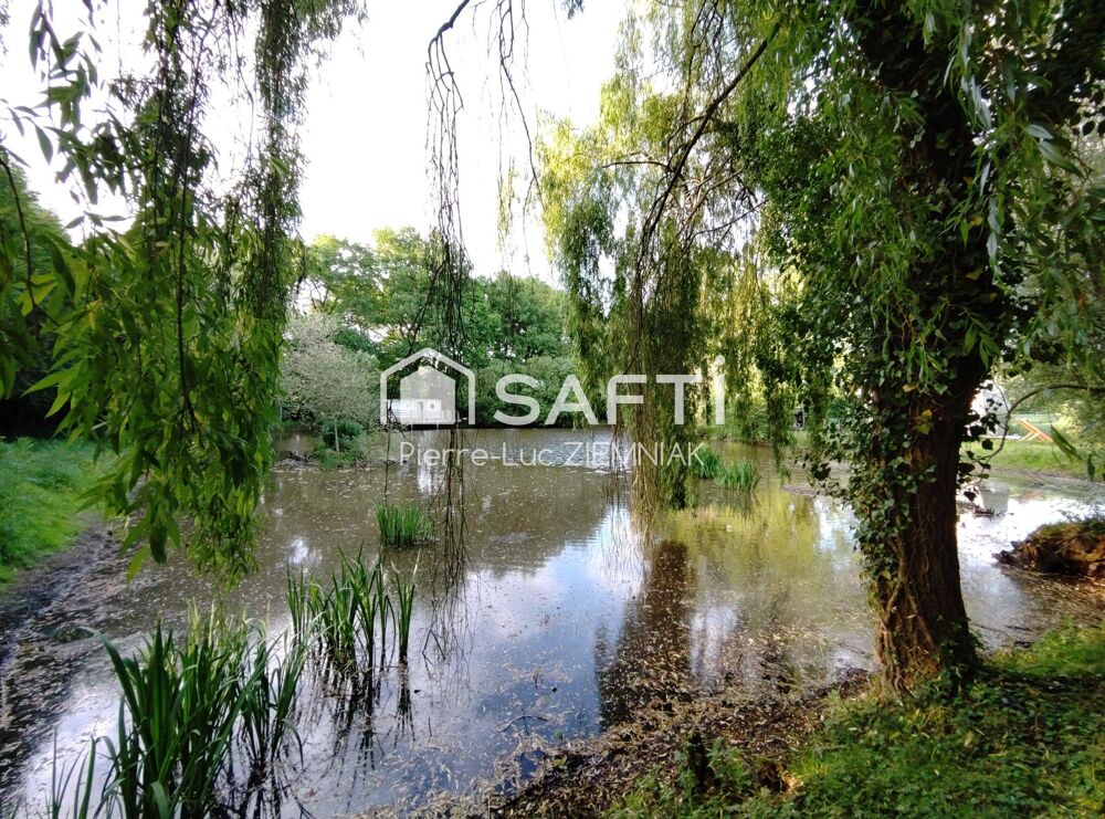 Vente Terrain Terrain de loisirs avec étang et mobil-home – 4100 m² clos à Houssay (53360) Houssay