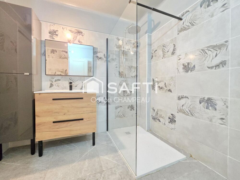 Appartement 4 pièces  74 m²  parking + cave