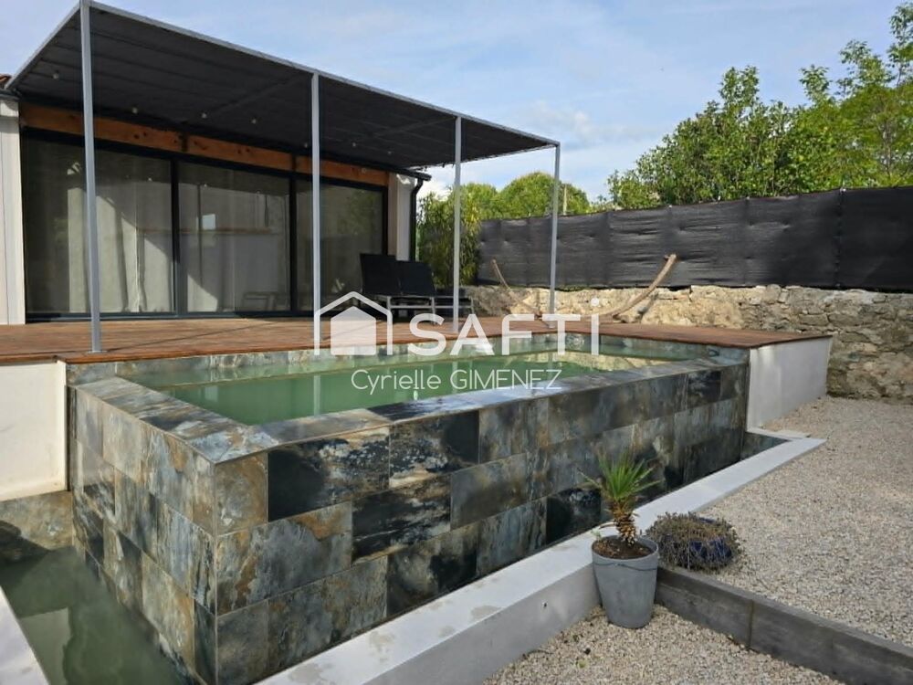 Maison moderne de 147 m2 de plain pieds, avec piscine à débordement sur Malemort-du-comtat