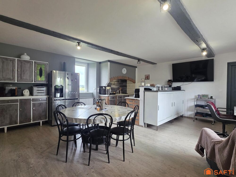 Ensemble de deux logements, atelier, dépendances et autonomie énergétique